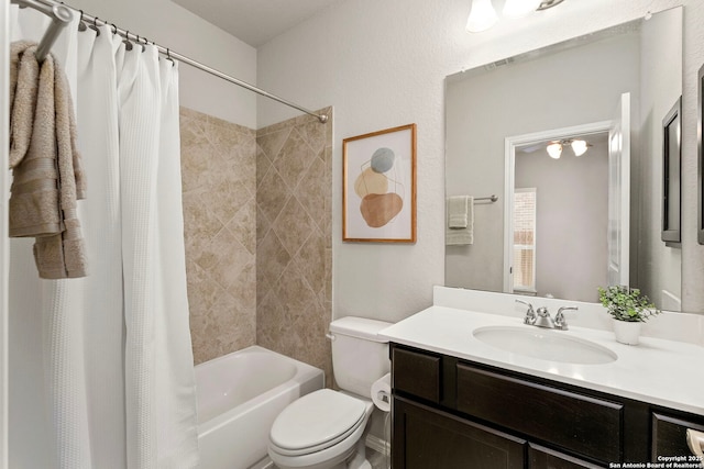 full bathroom featuring shower / bathtub combination with curtain, vanity, and toilet