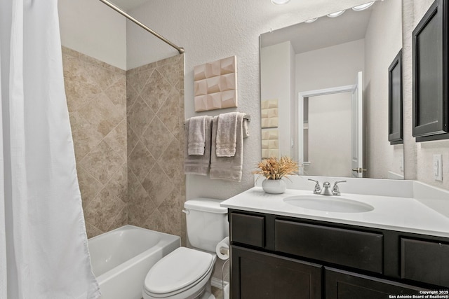 full bathroom with vanity, toilet, and shower / bath combo