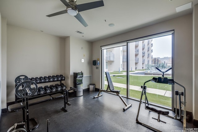 exercise area with ceiling fan and a wealth of natural light