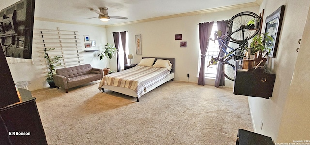 carpeted bedroom featuring ornamental molding and ceiling fan