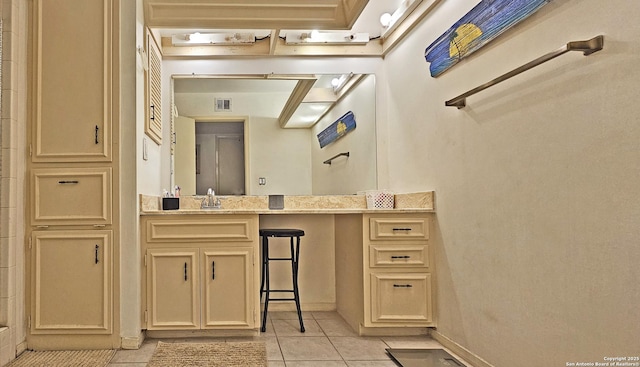 bathroom with vanity and tile patterned flooring