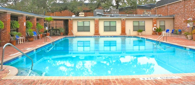 view of pool with a patio area