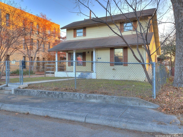 view of front facade featuring a porch and a front yard