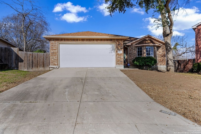 ranch-style house featuring a garage