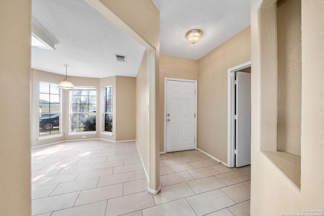 view of tiled entrance foyer