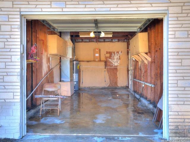 storage area featuring electric panel and water heater