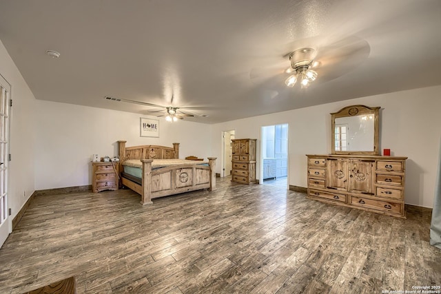 bedroom featuring dark wood-type flooring and ceiling fan