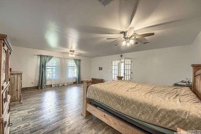 bedroom featuring dark wood-type flooring and ceiling fan