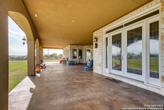 view of patio featuring french doors