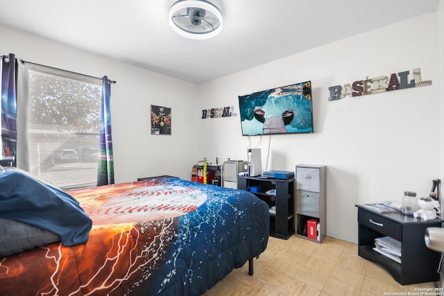 bedroom featuring light parquet flooring