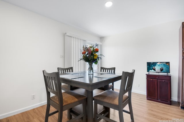 dining room featuring light hardwood / wood-style floors