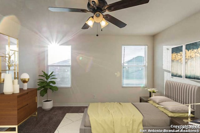 bedroom featuring dark tile patterned flooring