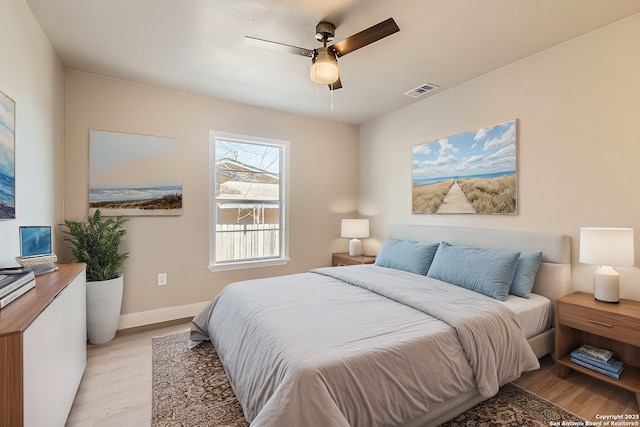 bedroom featuring ceiling fan and light hardwood / wood-style floors