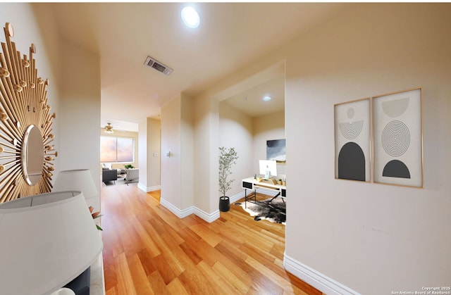 hallway featuring hardwood / wood-style floors