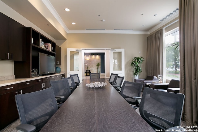 office area featuring crown molding