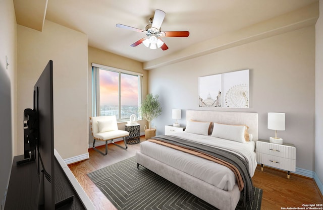 bedroom featuring hardwood / wood-style floors and ceiling fan