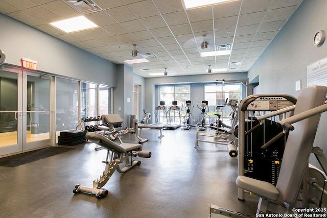 exercise room with a drop ceiling