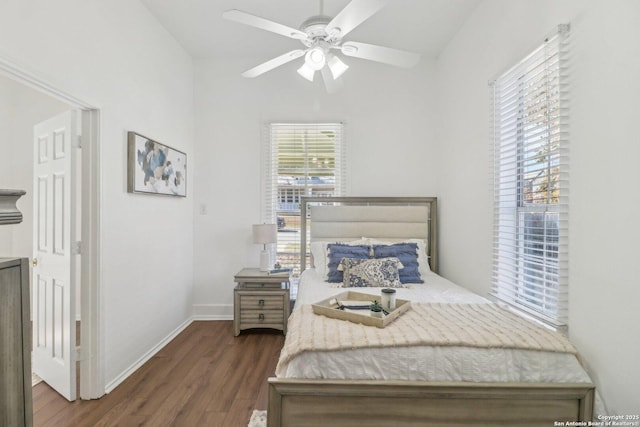 bedroom featuring dark hardwood / wood-style floors and ceiling fan