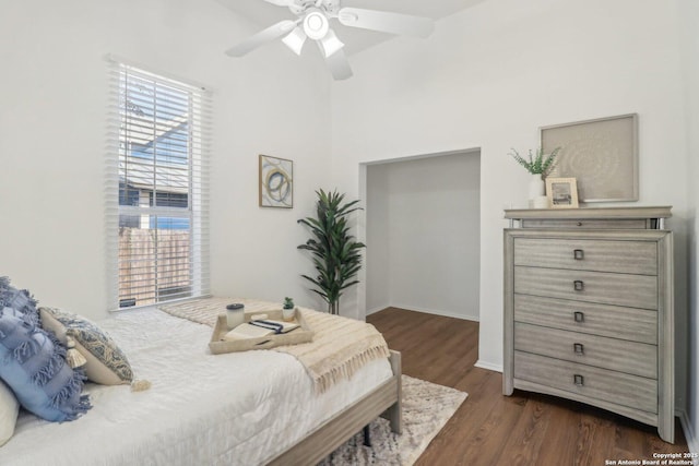 bedroom featuring dark wood-type flooring and ceiling fan