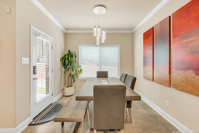 dining room featuring a wealth of natural light and ornamental molding