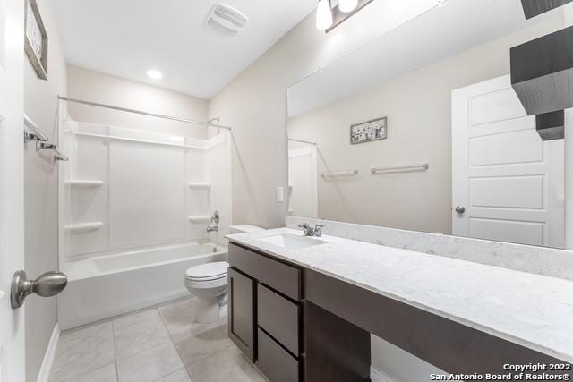 full bathroom featuring vanity, toilet, tub / shower combination, and tile patterned flooring