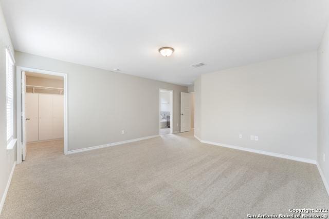 view of carpeted spare room