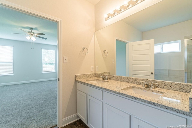 bathroom with vanity, plenty of natural light, and ceiling fan