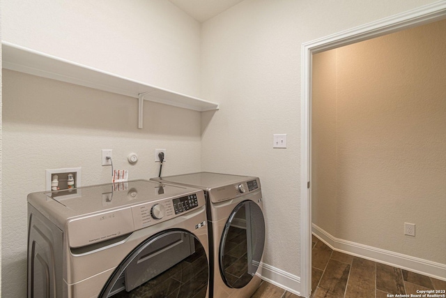 washroom with separate washer and dryer