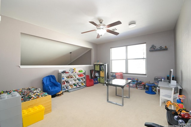 game room with carpet floors and ceiling fan