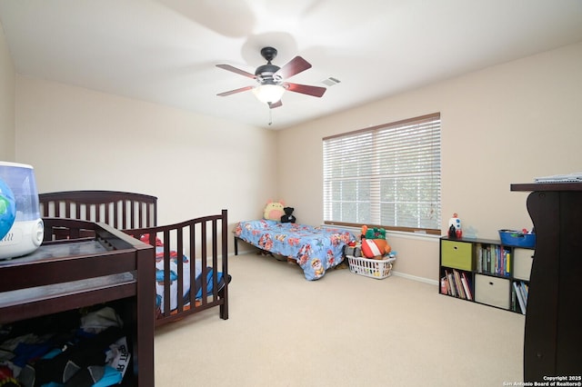 bedroom featuring carpet flooring and ceiling fan