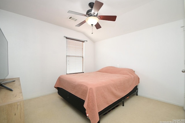 carpeted bedroom with lofted ceiling and ceiling fan