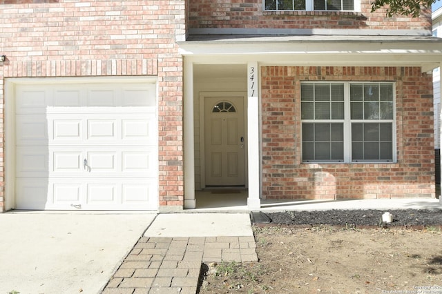 entrance to property featuring a garage