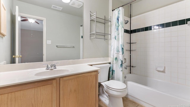 full bathroom with vanity, tile patterned flooring, toilet, and shower / bath combo