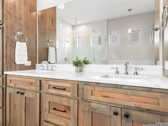 bathroom with vanity and walk in shower