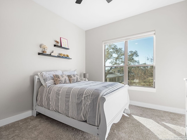 bedroom featuring ceiling fan and carpet flooring