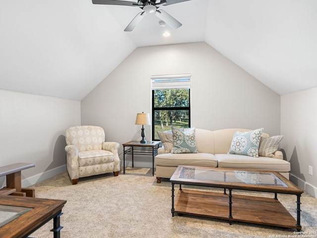 carpeted living room featuring vaulted ceiling and ceiling fan