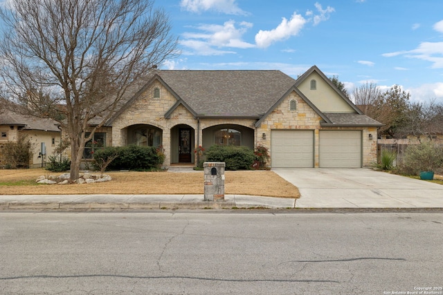 view of front of property featuring a garage