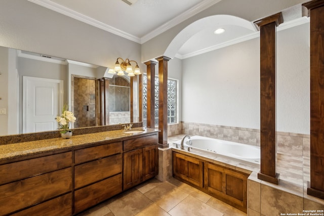 bathroom with decorative columns, ornamental molding, vanity, independent shower and bath, and tile patterned flooring