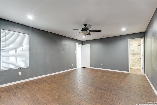 unfurnished room with hardwood / wood-style floors and ceiling fan