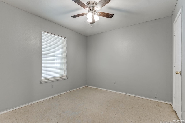 spare room featuring ceiling fan