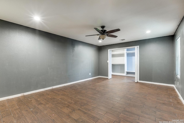 unfurnished room featuring ceiling fan and hardwood / wood-style floors