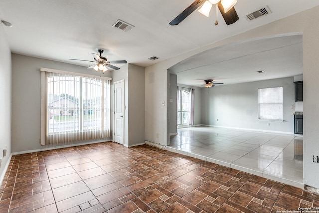 spare room featuring ceiling fan