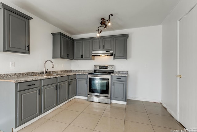 kitchen featuring gray cabinets, stainless steel electric range oven, sink, and light tile patterned flooring