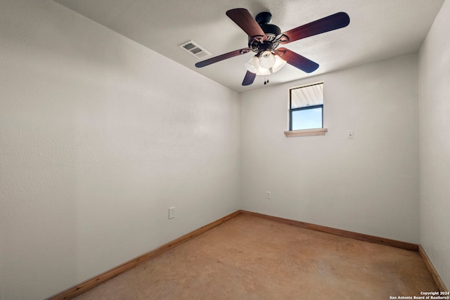 spare room with ceiling fan