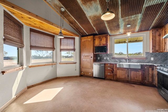 kitchen with hanging light fixtures, tasteful backsplash, appliances with stainless steel finishes, and sink