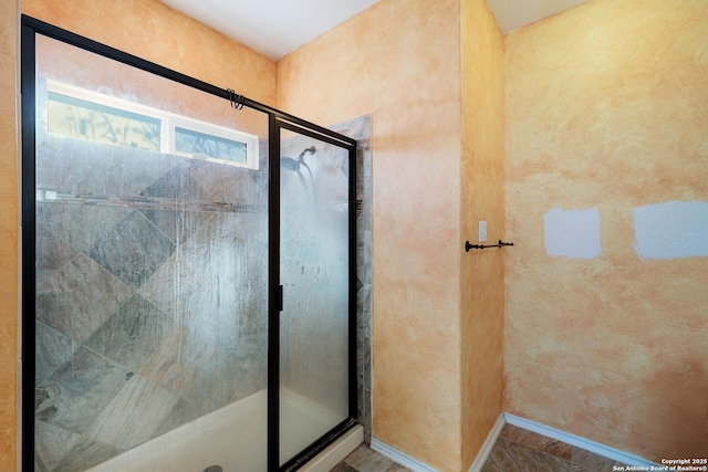 bathroom with an enclosed shower