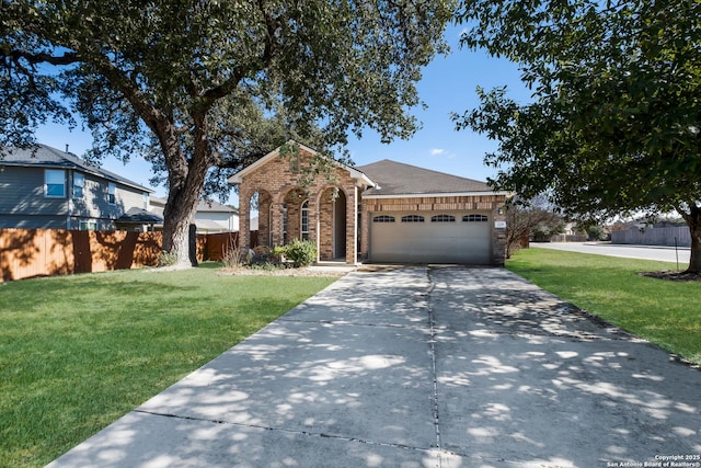 view of front of house with a garage and a front yard