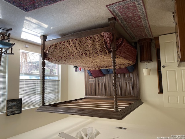 interior space with a textured ceiling