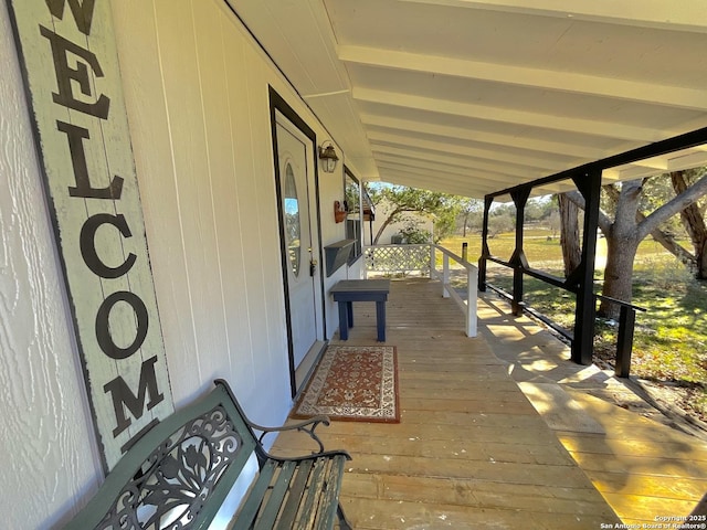 deck featuring covered porch