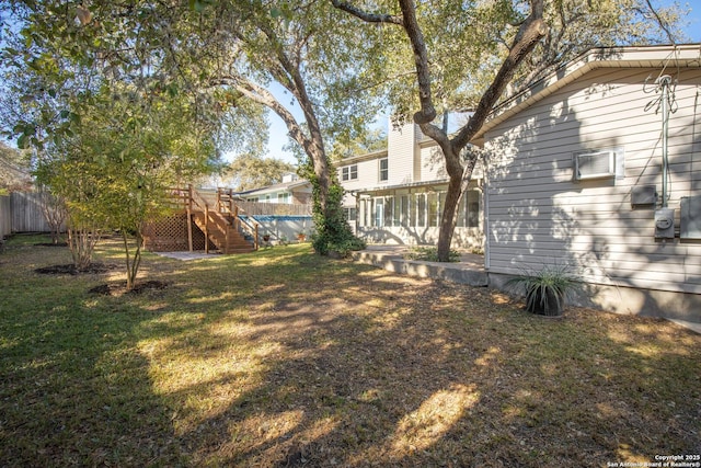 view of yard featuring a wooden deck